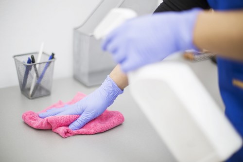 Cleaning invoice and booking confirmation documents on a desk