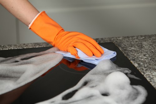 Cleaning technician applying safe carpet cleaning practices