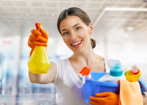 Local cleaner deep cleaning a bathroom during move-out cleaning in NW8