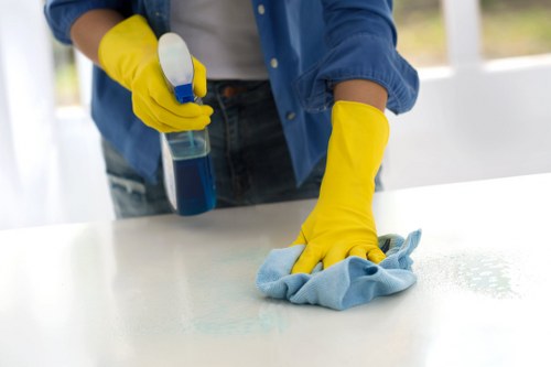 Local home cleaners preparing a tidy living room in NW8